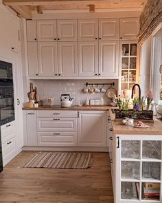 the kitchen is clean and ready for us to use it's appliances as well