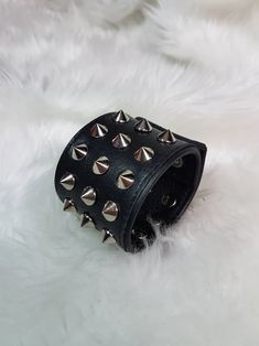 Leather cuff bracelet wristband for women s. Metal Rocker | Etsy Adjustable Strap Edgy Bracelets, Punk Style Leather Cuff Bracelet With Wrist Strap, Punk Style Adjustable Cuff Bracelet With Rivets, Punk Adjustable Cuff Bracelet With Rivets, Trendy Metal Wristband For Party, Adjustable Punk Cuff Bracelet With Rivets, Edgy Band Bracelet For Concerts, Punk Style Leather Cuff Bracelet, Edgy Band Bracelet For Concert