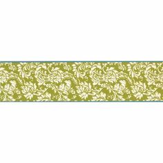 a green and white wallpaper border with an ornate design on the bottom half of it