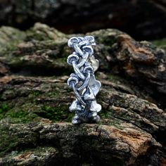 Crafted from sterling silver, this ring features an interwoven branch and a whimsical mushroom, creating a fantasy Celtic branch design. This Dainty Nature Ring is the perfect choice for those who appreciate the enchanting beauty of the natural world.  Characteristics: Metal - Recycled solid sterling silver  Finish - Oxidized. View all silver elven rings: https://www.etsy.com/shop/TinyShinyJewel?ref=seller-platform-mcnav&section_id=47130640 Care instructions: To care for the ring, avoid contact with water and chemicals such as perfumes and lotions. When the ring is not in use, store it in a dry, cool place to prevent tarnishing. Additional information:  ✦ All rings are made to order. An average turnaround time is 1-5 days. I will make every effort to ship the ring sooner. ✦ FREE delivery. Rings Without Stones, Branch Wedding Band, Elven Ring, Wedding Bands For Her, Pure Form, Branch Design, Nature Ring, Understated Elegance, Center Stage