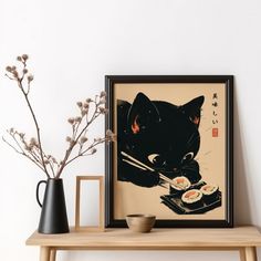 a black cat eating sushi with chopsticks in front of it on a table