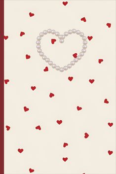 a card with hearts and pearls in the shape of a heart