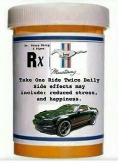 a jar of rx car paint sitting on top of a table