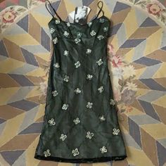 Vintage Betsey Johnson Midi Dress Perfect For A Cocktail Party Gorgeous Condition, New With Tags Amazing Silhouette Size 4, Fits A 2 / 4 / S Ribbon And Rosette Detailing Green Iridescent Mermaid Vibes Adjustable Straps Low Cut Sexy For Reference, I’m Modeling - I’m 5’1”, 28” Waist, 30d Chest. It Fits Me Very Well. I Wouldn’t Go Larger In The Waist. You Can Go A Tiny Bit Larger In The Chest But Not Much. Would Look Great On Someone Petite Or Someone Tall! Fitted Midi Dress For Festive Occasions, Y2k Style Sleeveless Evening Dresses, Y2k Style Green Mini Dress, Y2k Green Mini Dress, Green Y2k Style Mini Dress, Green Y2k Mini Dress, Festive Fitted Midi Dress, Green Y2k Style Summer Dress, Y2k Fitted Party Dresses