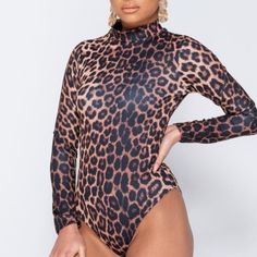 Leopard Print Animal Print Long Sleeve High Neck Bodycon Bodysuit Leotard Top Leopard Print Animal Print Long Sleeve High Neck Length Is 26 Inches For Size S & Size 4 95% Polyester, 5% Elastane Made In U.K Also In Snake Print, Marble Print And Abstract Print New With Tag Size S = 4 Size M = 6-8 Size L = 10-12 Model Is Wearing Size S If You Have Any Questions, Please Let Me Know Thank You For Stopping By My Boutique To Read Reviews; Go To My Boutique Page By Clicking On My Username, Then Click On Stretch Leopard Print Bodysuit For Night Out, Brown Stretch Bodysuit, Brown Fitted Long Sleeve Bodysuit, Fitted Brown Long Sleeve Bodysuit, Fitted Leopard Print Bodysuit For Party, Fitted Leopard Print Swimwear For Party, Stretch Leopard Print One-piece Swimwear, Brown Stretch Bodysuit For Night Out, Fitted Brown Bodysuit For Fall