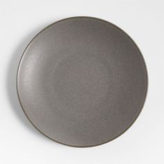 an empty gray plate on a white background