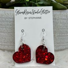 Stainless Steel Handmade Earrings Party Heart Drop Earrings With Ear Wire, Red Glitter Earrings For Party, Red Glitter Jewelry For Party, Red Glitter Party Earrings, Handmade Heart Earrings For Valentine's Day Party, Red Double Heart Earrings For Party, Red Glitter Earrings For Gift, Glitter Red Earrings For Gifts, Valentine's Day Festive Heart-shaped Jewelry