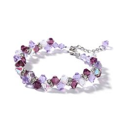 A dazzling twist on a classic style, this sparkling bracelet complements any attire. This design shimmers with fancy purple crystals and glittering white crystals. An anytime look of wonder, this shimmering bracelet is an on-trend style story.Weight: 11.1 gMaterial: Stainless SteelBracelet Size: 205 mmStone Type: Jeulia® StonePlating Color: Silver Dazzling Crystal Bracelet With Sparkling Stones, Elegant Crystal Beaded Bracelets With Faceted Details, Elegant Faceted Crystal Beaded Bracelets, Glamorous Crystal Bangle Bracelet, Dazzling Crystal Bracelets With Sparkling Stones, Sparkling Crystal Bracelets With Dazzling Style, Sparkling Crystal Bracelets, Lavender Crystal Jewelry For Party, Sparkling Crystal Bangle Bracelets