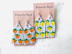 These earrings are summer ready!! Fun and playful! 🍊🍋 These earrings are made with delicate Miyuki Delica beads and each bead is hand woven. These are super light.  The ear wire is base metal and is nickel and lead free. Please let me know if I can answer any questions. These can be customized to your preference of color! Visit my Etsy shop for more: https://etsy.me/3my7URS Length - 2.25 inches Drop length - 2.75 inches Width - 1 inch Summer Tassel Earrings Gift, Handmade Tassel Earrings For Summer Vacation, Handmade Tassel Earrings For Beach In Spring, Handmade Tassel Earrings For Spring Beach, Orange Tassel Jewelry For Summer, Summer Orange Tassel Earrings Gift, Summer Beach Tassel Earrings With Beaded Fringe, Orange Beaded Dangling Earrings For Summer, White Handwoven Earrings For Summer