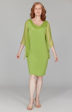 Our signature silk sheath dress, detailed with a floaty silk chiffon sleeves and a beautifully draped neckline. Unlined and finished with a simple back zip closure. Silk Dresses With Overlay, Elegant Flowy Midi Dress With Sheer Sleeves, Evening Sheath Chiffon Dress, Silk Chiffon Evening Dress With Sheer Sleeves, Chiffon Sheath Cocktail Dress, Chiffon Dresses With Draped Sleeves, Flowy Silk Crepe Evening Dress, Formal Dress With Sheer Silk Chiffon Sleeves, Elegant Silk Dress With Overlay