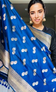 Pre-order Delivery 3-4 weeks before it from order date. This stunning blur 100% Mulberry Katan silk saree is handwoven in Banaras, known for its intricate designs and high-quality craftsmanship. The saree features a beautiful shade of pink with golden zari jaal work, creating a mesmerizing effect. The saree is perfect for any special occasion, such as a wedding, festival, or formal event. Comes finished with hand fall and Pico. And a blouse piece with zari border. Silk Mark Certified Note: Color Katan Silk Saree, Ambience Lighting, Katan Silk, Banarasi Sarees, Saree With Blouse, Intricate Designs, Blouse Dress, Blouse Piece, The Chic