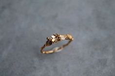 Gold Flower Ring Nature-inspired, Gold Flower-shaped Nature-inspired Rings, Gold Nature-inspired Flower Ring, Delicate Gold Flower Ring For Wedding, Handmade Gold Flower Ring Nature-inspired, Nature-inspired Gold Flower Ring, Handmade Gold Flower Ring, Nature-inspired, Handmade Gold Flower Ring For Wedding, Dainty Gold Flower Ring For Wedding