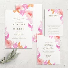 wedding stationery with watercolor flowers and greenery on the front, back and inside