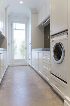 an image of a kitchen with white cabinets and appliances on the appliance screen