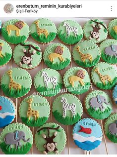 there are many cupcakes with animals on them