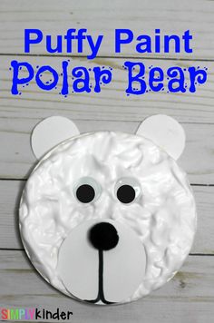 a polar bear craft with the words puffy paint on it's face and eyes