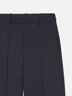 MID RISE | WIDE LEG | LONG LENGTH  Details & Size Guide  This relaxed trouser features a flattering mid-rise with a slouchy fit and relaxed straight leg that is designed to stack at the ankle with a 34" inseam. Crafted from a pinstripe wool fabrication with traditional trouser pockets and center pleats at the front and back.  FITS TRUE TO SIZE Frame Store, Relaxed Trousers, Trouser Pocket, Long Length, Size Guide, Mid Rise, Straight Leg, Wide Leg, Trousers