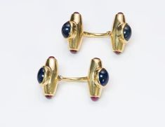 Sapphire Ruby 18K Gold Cufflinks Vintage Sapphire Ruby 18K yellow gold cufflinks. Approximate Measurements: Length... Polished Yellow Gold Earrings For Business, Hallmarked 14k Gold Cufflinks For Business, Hallmarked Yellow Gold Cufflinks For Formal Occasions, Designer Yellow Gold Cufflinks With Polished Finish, Modern Yellow Gold Formal Cufflinks, Modern Yellow Gold Cufflinks For Formal Wear, Luxury Gold Jewelry For Office, Vintage Sapphire, Genuine Love