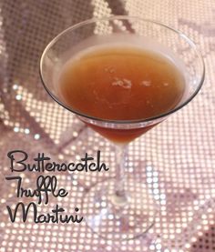 a drink in a martini glass with the words butterscotch, thrift me martini