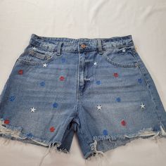 No Boundaries Nobo Cute Shorts Perfect For The Summer And Fourth Of July. Light Distressing On The Cuff Hem, No Holes. Red, White And Blue Stars Embroidery On The Front Of The Shorts. Back Does Not Have Stars. Nwot, New With Out Tags Size 9 72% Cotton, 22% Rayon, 1 % Other Fabric Copper Color Zipper And Button. Medium Wash Cotton Bottoms With Star Print, Cotton Shorts With Star Print, Trendy Cotton Jean Shorts With Star Print, Blue Star Print Short Bottoms, Blue Shorts With Star Print, Trendy Cotton Jean Shorts For 4th Of July, Blue Star Print Shorts, Cotton Star Print Shorts, Cotton Cutoff Jean Shorts For 4th Of July