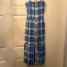 Never Worn Withtag Super Cute And In Excellent Condition. Summer Blue Plaid Dress With Tie Straps. Size Medium Casual Blue Cotton Sundress, Blue Casual Cotton Sundress, Casual Plaid Dresses For Vacation, Plaid Midi Dress For Vacation, Plaid Cotton Sundress For Vacation, Casual Plaid Maxi Dress For Summer, Blue Casual Maxi Dress For Daytime, Plaid Cotton Sundress For The Beach, Casual Cotton Maxi Dress For Daytime