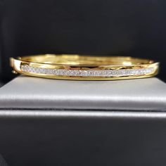 "💗💎Description: Diamond Side Trim Bangle L Thick Bangle Real gold luxury bangle 💗💎Material: Diamonds Bangle side trim 9K- Gold White ,Yellow Gold, white gold or rose gold 💗💎Diamonds: Diamonds round billion cut top 31 pcs Weight : 0.31 Ct Gold Weight:10.5 G. Face wide 5mm. What Color Diamond & Clarity Q&A Diamond Color : H Diamond Clarity: VS-SI Diamond Cut - EXCELLENT 💗💎 Q&A Are Real Diamonds? What type of Diamond do you use ? YES, Diamond tester is verify are real diamond 10 Diamond Bangles, Womens Bangles, Gold Luxury, Diamond Bangles Bracelet, Types Of Diamonds, Cut Top, Work Jewelry, Diamond Bangle, Rose Gold Diamonds