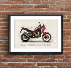 a motorcycle is mounted on a brick wall in front of a black framed photograph with the words honda