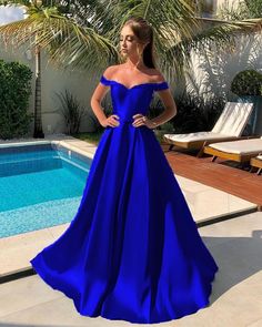 Royal Blue A-line Evening Dress For Prom, Royal Blue Satin Prom Evening Dress, Royal Blue Ball Gown For Banquets, Royal Blue Bridesmaid Dress For Prom Season, Prom Royal Blue Ball Gown Evening Dress, Homecoming Floor-length Gown For Party Season, Floor-length Homecoming Gown For Party Season, Floor-length Gown For Homecoming Party, Royal Blue Floor-length Ball Gown