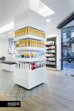 the inside of a store with shelves filled with products and condiments on display