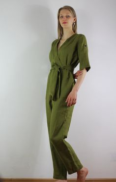 "Write the selected color in the message Linen jumpsuit with belt and 2 pockets in olivecolor, perfect for casual wear and suitable for any occasion in any season Details: - 100% natural linen produced in Europe ; - medium weight (180 gram per square meter); - color: olive, can be any from our colors catalog (color samples at the photo); Made to order, approximately a few days, If you have any questions please message me and I will be glad to answer. Size guide : Size XS Bust: fits bust around 3 Casual Olive Jumpsuits And Rompers For Spring, Green Tie Waist Jumpsuit For Work, Green Belted Jumpsuits And Rompers For Summer, Summer Green Belted Jumpsuits And Rompers, Green Linen Jumpsuits And Rompers For Spring, Spring Green Linen Jumpsuits And Rompers, Spring Linen Belted Jumpsuits And Rompers, Green Belted Jumpsuits And Rompers For Work, Green Linen Jumpsuits And Rompers With Pockets