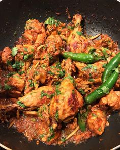 a pan filled with chicken and green beans