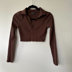 Super Cute Cropped Longsleeve In A Rich Dark Brown Color. Never Worn. Zara Long Sleeve Solid Sweater, Zara Long Sleeve Black Sweater, Trendy Brown Long Sleeve Tops, Brown Stretch Long Sleeve Crop Top, Zara Fitted Long Sleeve Sweater, Chic Brown Long Sleeve Tops, Zara Cropped Crop Top For Fall, Zara Long Sleeve Tops In Solid Colors, Brown Cropped Top For Fall