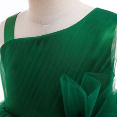 This Dress is fashionable for every occasion. the dress is made-to-order by professional tailors. You can choose from 50 colors, Regular sizes 2 to 16 and plus sizes 14w to 26W. Custom size is also available.. The product details: Color: Emerald Green, Length: Long, Neckline: High-neck, Primary Fabric: Tulle, Silhouette: A-Line Elegant Green Princess Dress For Prom, Green Tulle Bridesmaid Dress For Party, Elegant Green Sleeveless Tutu Dress, Sleeveless Green Tulle Tutu Dress, Green Sleeveless Tulle Tutu Dress, Sleeveless Green Tutu Dress For Party, Green Sleeveless Tutu Dress For Party, Elegant Green Tutu Dress For Spring, Elegant Fitted Green Tutu Dress