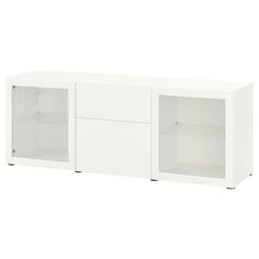 a white cabinet with two doors and shelves