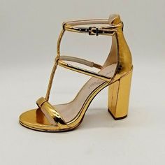 Kenneth Cole Womans Deandra High Heel Sandal Gold Closed Back Buckle 6m New New With Box Size: 6 M Color Family: Gold Man Made Upper Open Toe Closed Back Ankle Strap With Buckle Closure Cushioned Insole Ultra High Block Heel *Box May Have Damage Adjustable Gold High Heels, Adjustable Ankle Strap Gold Heels, Adjustable Gold Heels For Spring, Glamorous Gold Sandals With Adjustable Fit, Adjustable Glamorous Gold Sandals, Glamorous Adjustable Gold Sandals, Gold Man, Peep Toe Wedge Sandals, White Wedge Sandals