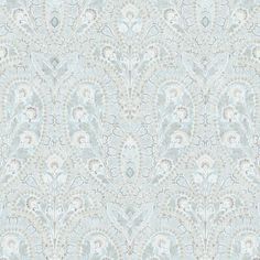 a blue and white wallpaper with an ornate design