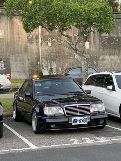 several cars are parked in a parking lot