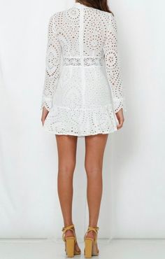 This white embroidered dress is perfect for any white party event. Style with your hair pulled back and cute sandals to complete the look. Finished with a concealed back zipper. Chic Summer Embroidered Wedding Dress, Chic Summer Wedding Embroidered Dress, Spring Lace Mini Dress With Back Zipper, Spring Lace Dress With Back Zipper, Elegant Embroidered Summer Lace Dress, Spring Party Lace Dress With Back Zipper, Elegant Embroidered Lace Dress For Summer, White Long Sleeve Mini Dress With Back Zipper, White Lace Dress With Back Zipper