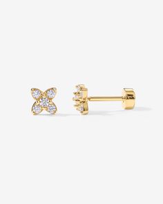 Look gorgeous even when sleeping with our new Must-have Flat Back earrings. These Tiny Flower Flat Back Studs are breathtakingly worn solo or as part of an earring stack. Materials: 14K yellow, rose or white gold plated Measurements: 4.5mm x 4.5mm. These small stud earrings are Crafted with a S925 post that screws into our flat back disc. Gold Huggie Flower Earrings For Pierced Ears, Gold Flower Cartilage Earrings As Gift, Flower Shaped Gold Cartilage Earrings For Gift, Gold Flower Cartilage Earrings For Gift, Dainty Yellow Gold Earrings With Screw Back, Earring Stack, Flower Flat, Small Stud Earrings, Flat Back Earrings