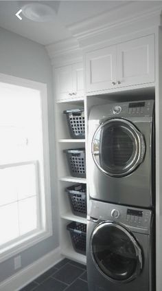 a washer and dryer in a small room