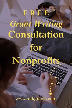 a woman is typing on her laptop with the words free grant writing consultation for non profits