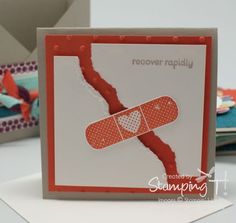 a close up of a greeting card with a broken piece of paper on the front