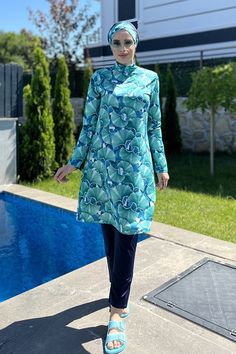 This special elastic burkini suit in blue tones with a Hawaiian theme offers you comfort and elegance together. With the assurance of Burkini Remsa, you can safely place your order and receive it easily. In addition, this specially designed product is produced from high-quality fabric and has water repellent properties. Hawaiian Theme, Place Your Order, Blue Suit, Blue Tones, Swim Suit, Repellent, Water Repellent, Quality Fabric, Hawaii