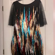 New! Colorful Sequin Dress. Never Worn. I Loved It, Bought It And Nowhere To Wear It Sheer Bottom Hem And Sleeves. Actual Measurements Are In Pics. Super Pretty! Multicolor Sequined Dresses For Celebrations, Multicolor Short Sleeve Mini Dress For Party, Multicolor Short Sleeve Dresses For Party Season, Glamorous Multicolor Festive Dress, Fitted Black Mini Dress For Holiday, Black Festive Mini Dress For Party Season, Multicolor Fitted Holiday Dresses, Multicolor Summer Dress For Celebration, Black Sequined Celebration Dress