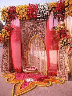 A WEDDING PLANNER: Indian wedding stage decorations and indian wedding mandap decorations Indian Mandap, Floral Rangoli, Marigold Garland, Reception Entrance, Wedding Ceremony Ideas, Entrance Gate, Entrance Ideas, Indian Wedding Inspiration