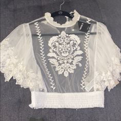 Medium Spring Trendy Lace Top Blouse, Summer Sheer Lace Crop Top, Spring Lace Crop Top For Night Out, Sheer Lace Crop Top For Summer, Sheer Lace Crop Top For Spring, Trendy White Lace Top, Trendy Lace Tops For Day Out, Chic Sheer Crop Top For Spring, Forever 21 Summer Party Blouse