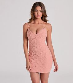 Create a romantic look in this mini dress perfect for bridal showers to graduations! The sleeveless dress features a V-neckline, sleek bungee spaghetti straps that create the open strappy back design, a bodycon fit, and is composed of a textured lace-lined fabric. Complete the look in strappy heels.Fit & FeaturesSleeveless V-necklineBungee spaghetti strapsOpen strappy back designBodycon silhouetteMini-length hemLined textured lace, moderate stretchRuns true to size V-neck Mini Dress With Adjustable Straps For Date Night, Feminine V-neck Mini Dress For Prom, Flirty Mini Dress For Bridesmaids, V-neck Mini Dress With Delicate Straps For Party, V-neck Mini Dress With Straps For Date Night, Flirty Dress With Sweetheart Neckline And Crisscross Straps, Chic V-neck Mini Dress With Delicate Straps, Mini Dress With Crisscross Straps For Brunch, Summer Bridesmaid V-neck Mini Dress