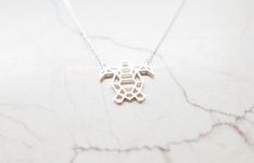 td {border: 1px solid #ccc;}br {mso-data-placement:same-cell;} In many ancient mythologies, the turtle represents the world. Here, it represents a turtle. Or possibly a tortoise. Or maybe even a terrapin. We'll go with turtle. Silver edition.Geometric origami animal turtle necklace, silver color. Our necklaces are delightfully packaged, ideal for a gift, with free US delivery. 925 Sterling Silver plated ultra durable stainless steel Precision laser cut Turtle pendant dimensions: 1 inch wide X 1 Silver Turtle Necklace For Gift, Silver Turtle Jewelry For Gifts, Silver Turtle Jewelry Gift, Turtle Shaped Sterling Silver Jewelry Gift, Sterling Silver Turtle Necklace For Gifts, Sterling Silver Turtle Jewelry Gift, Sterling Silver Turtle Necklace For Gift, Origami Animal, Origami Necklace