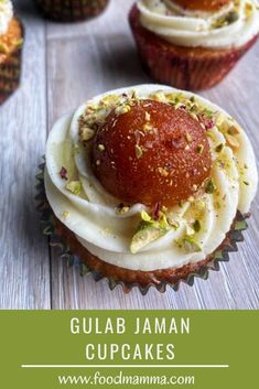 gulab jaman cupcakes with white frosting and sprinkles