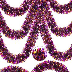 an image of a bunch of purple and yellow objects in the shape of a flower